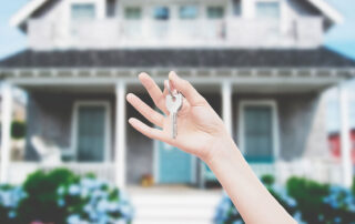 Holding new home keys